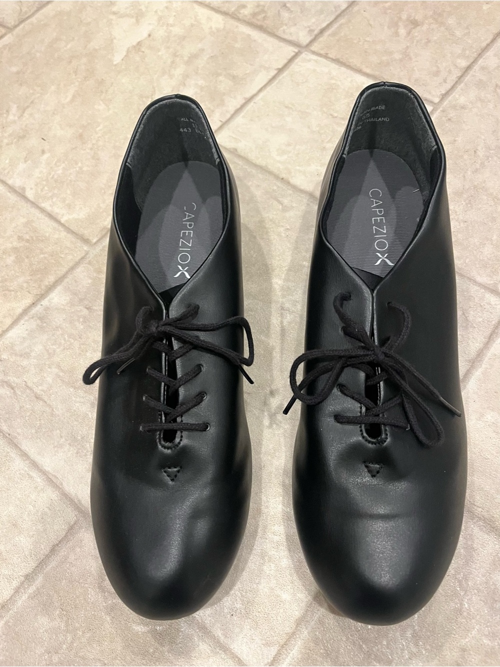 Capezio black Tele Tone tap shoes. Laces. Man made materials. Size 12m.